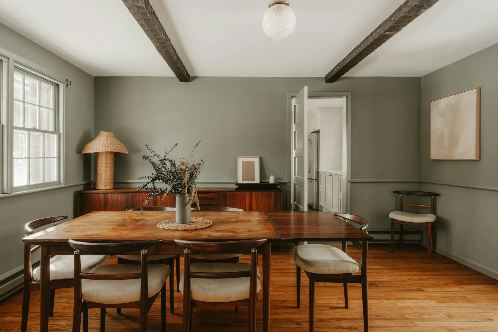 Dining room with walnut table and sideboard